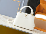 Capucines BB Taurillon Leather Handbag M94634