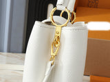 Capucines BB Taurillon Leather Handbag M94634