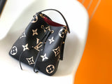 NéoNoé MM Bi-color Monogram Empreinte Leather Medium Bucket Bag M45497