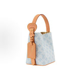2026 All In BB Bucket Bag in Messenger Blue, crafted from coated canvas with natural cowhide trim M27529
