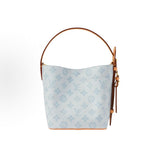 2026 All In BB Bucket Bag in Messenger Blue, crafted from coated canvas with natural cowhide trim M27529
