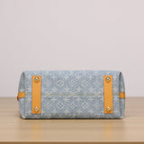 2026 CarryAll PM Handbag, Blue Monogram Denim M11462
